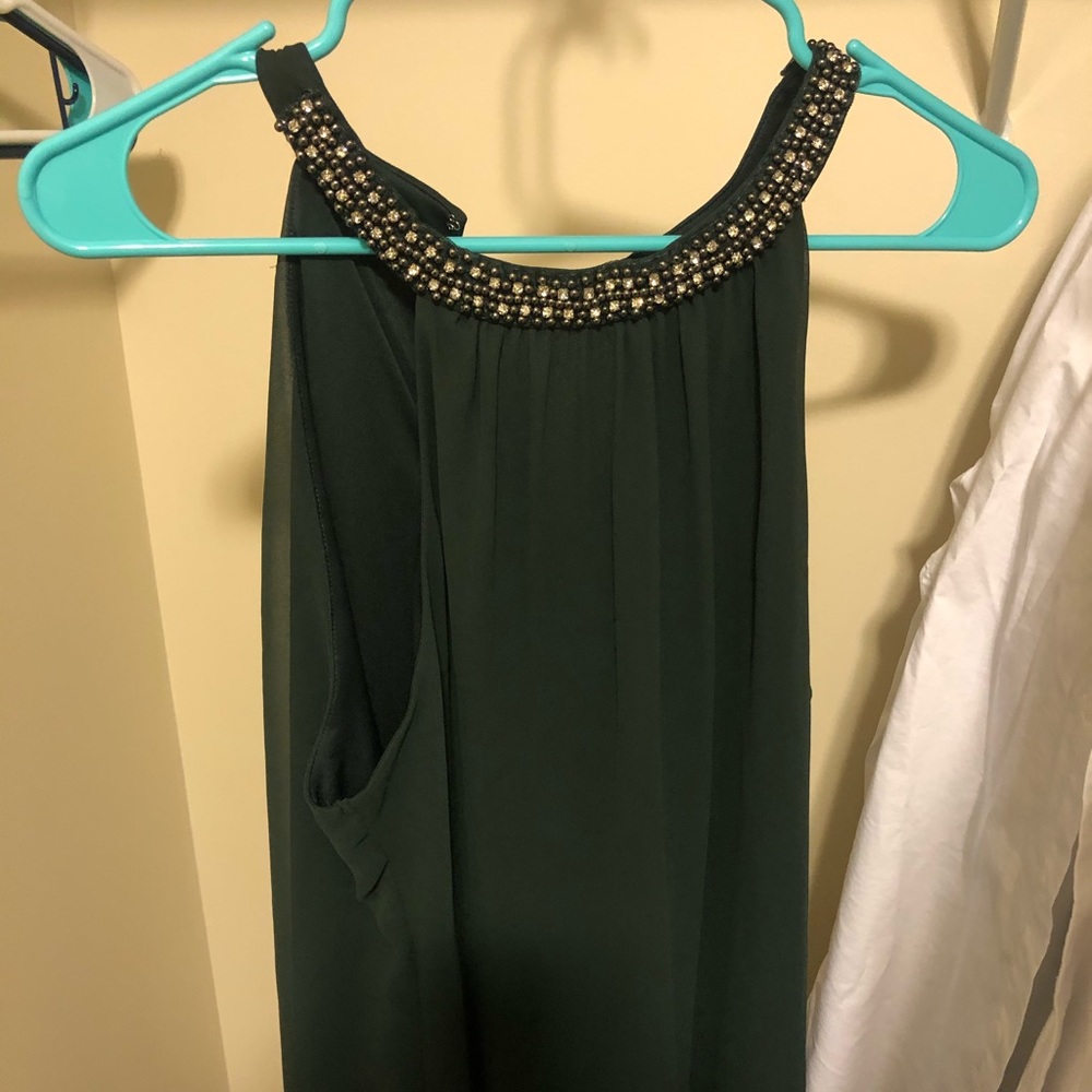 Green tank top with jewels on collar